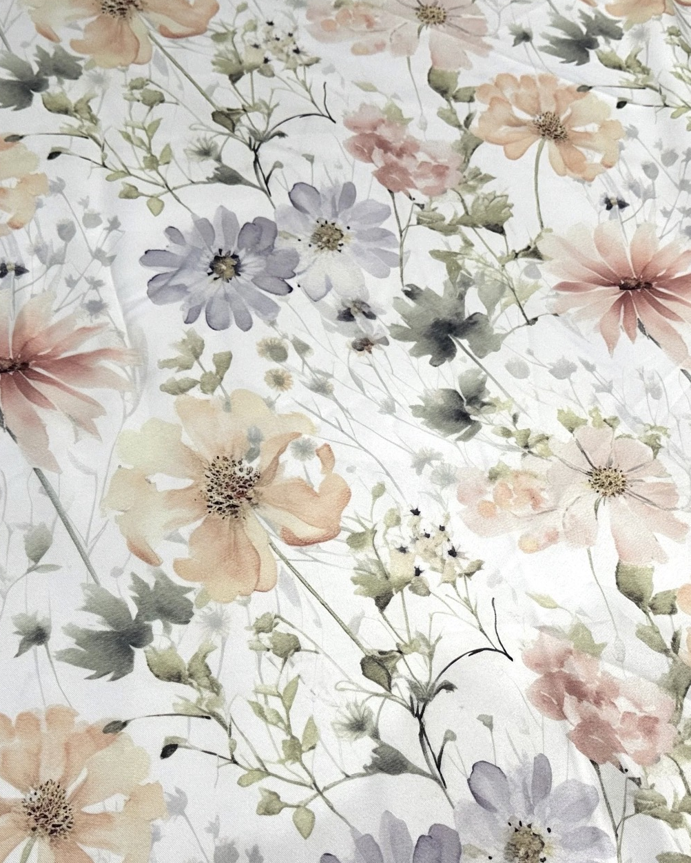 Floral watercolor round tablecloth with soft yellow, blush and lavender blooms